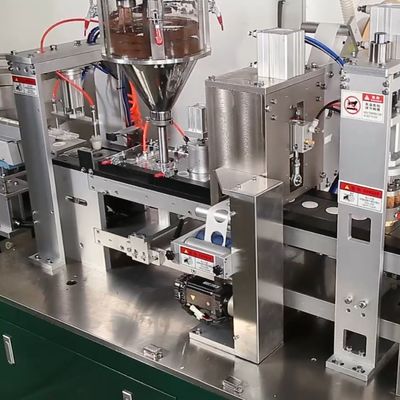 0.6Mpa Luftdruck Kaffeekapsel-Füllmaschine mit Schwing-Ausgangsarm